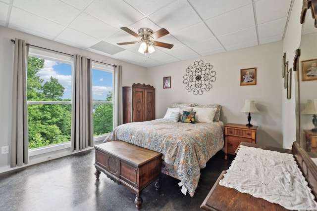 225 Ferguson Creek Rd, Sparta, TN 38583 - bedroom featuring a paneled ceiling, concrete floors, and ceiling fan