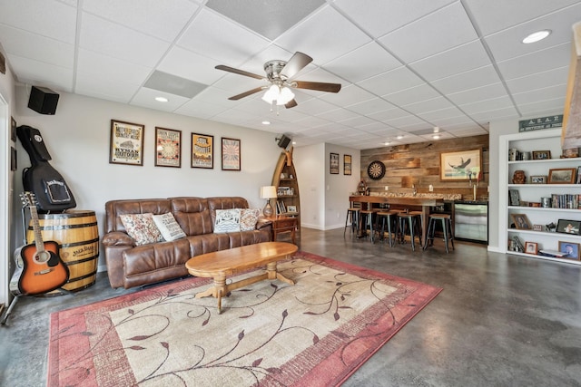 225 Ferguson Creek Rd, Sparta, TN 38583 - living room featuring concrete floors, ceiling fan, a paneled ceiling, and recessed lighting