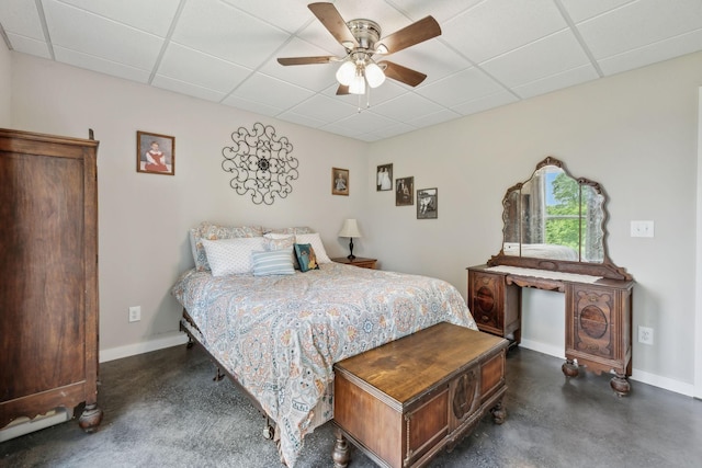 225 Ferguson Creek Rd, Sparta, TN 38583 - bedroom featuring a paneled ceiling, finished concrete floors, baseboards, and a ceiling fan