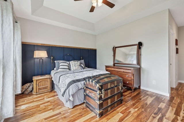225 Ferguson Creek Rd, Sparta, TN 38583 - bedroom with wood finished floors, a tray ceiling, ceiling fan, and baseboards