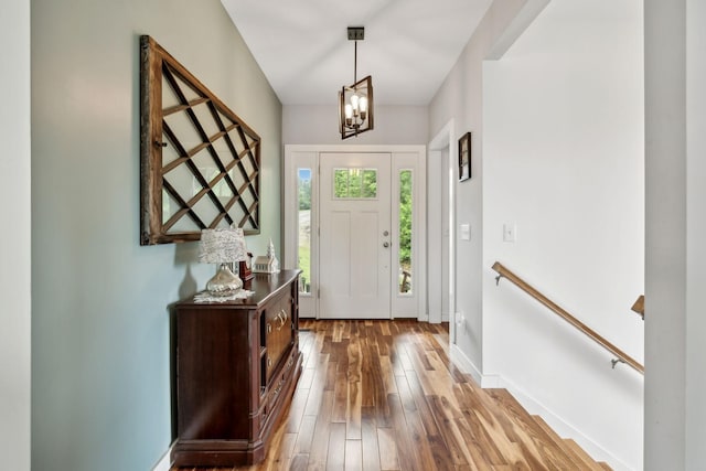 225 Ferguson Creek Rd, Sparta, TN 38583 - entryway with hardwood / wood-style floors, baseboards, and a chandelier