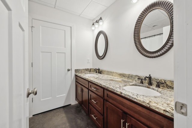 225 Ferguson Creek Rd, Sparta, TN 38583 - bathroom with finished concrete floors, double vanity, and a paneled ceiling