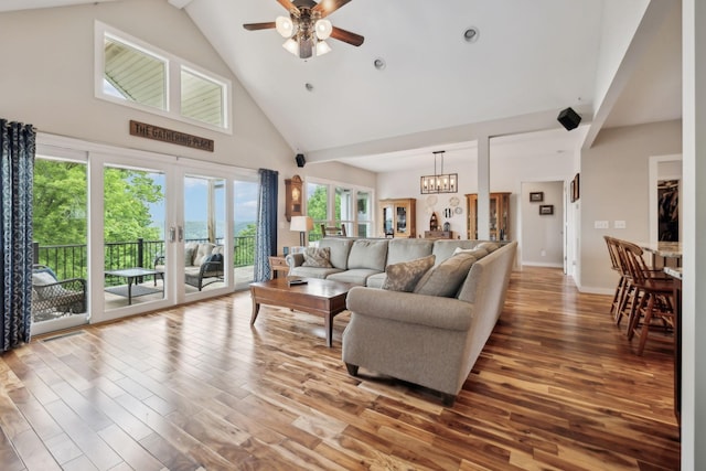 225 Ferguson Creek Rd, Sparta, TN 38583 - living area featuring high vaulted ceiling, ceiling fan, wood finished floors, a chandelier, and baseboards