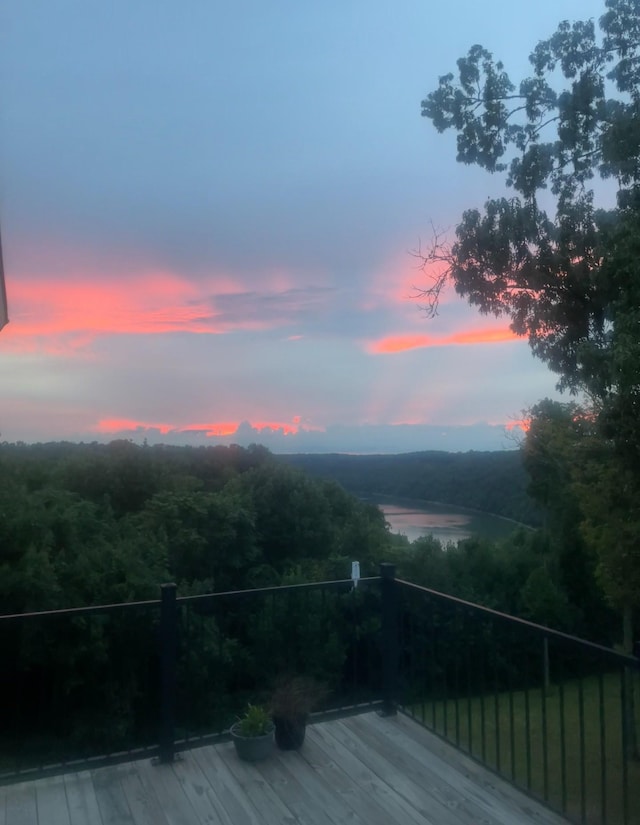 225 Ferguson Creek Rd, Sparta, TN 38583 - deck at dusk featuring a forest view