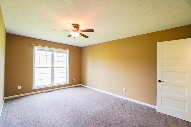41 Haven Way, Westmoreland, TN 37186 - empty room featuring ceiling fan, carpet floors, baseboards, and a textured ceiling