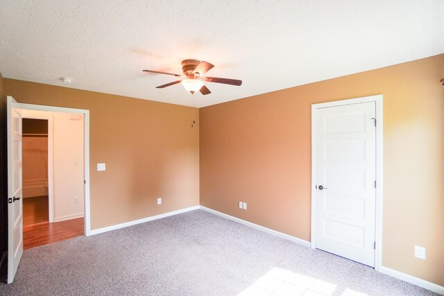 41 Haven Way, Westmoreland, TN 37186 - unfurnished bedroom with carpet floors, baseboards, a textured ceiling, and a ceiling fan