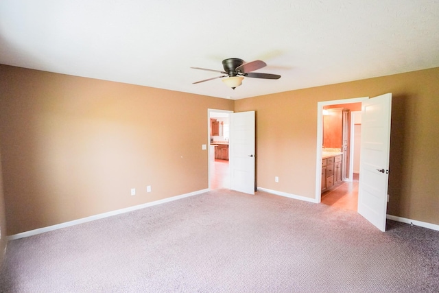 41 Haven Way, Westmoreland, TN 37186 - unfurnished bedroom featuring light colored carpet, baseboards, and a ceiling fan