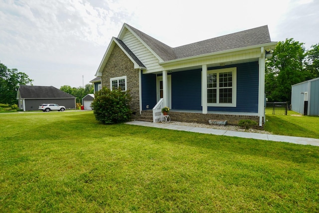 41 Haven Way, Westmoreland, TN 37186 - view of front of home with a front yard, roof with shingles, and a porch
