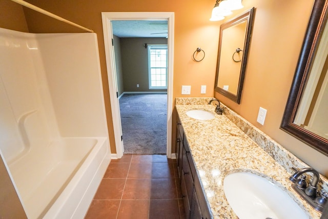 41 Haven Way, Westmoreland, TN 37186 - bathroom featuring double vanity, baseboards, tile patterned floors, and  shower combination
