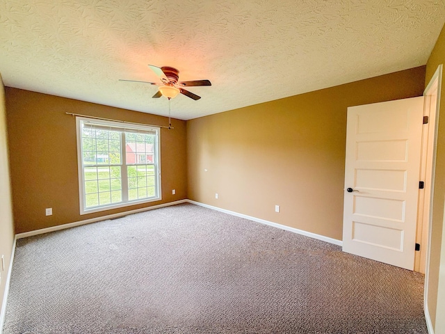 41 Haven Way, Westmoreland, TN 37186 - empty room with a ceiling fan, baseboards, carpet flooring, and a textured ceiling