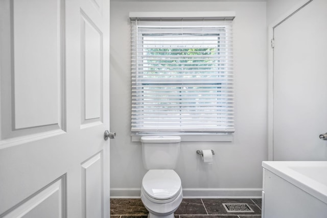 808 Winthorne Ct, Nashville, TN 37217 - bathroom with baseboards, toilet, and vanity