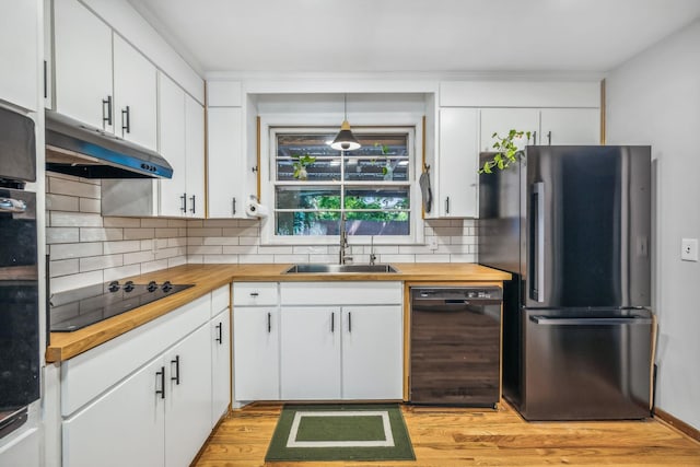 808 Winthorne Ct, Nashville, TN 37217 - kitchen with black appliances, butcher block countertops, a sink, and backsplash