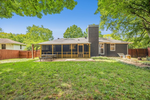 808 Winthorne Ct, Nashville, TN 37217 - back of property featuring a sunroom, a chimney, and a patio area