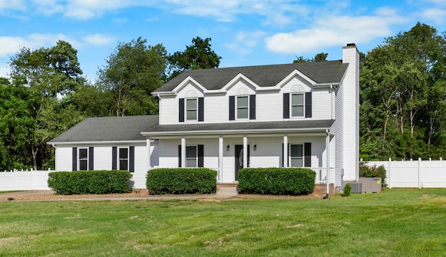 2746 Field Ct, Woodlawn, TN 37191 - traditional home featuring a chimney, a porch, and cooling unit