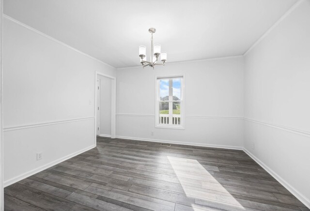 2746 Field Ct, Woodlawn, TN 37191 - spare room with a chandelier, wood finished floors, ornamental molding, and baseboards