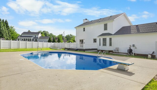 2746 Field Ct, Woodlawn, TN 37191 - view of swimming pool with a wooden deck, a patio area, and a diving board