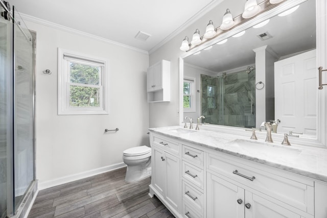 2746 Field Ct, Woodlawn, TN 37191 - bathroom with healthy amount of natural light, a stall shower, double vanity, toilet, and crown molding
