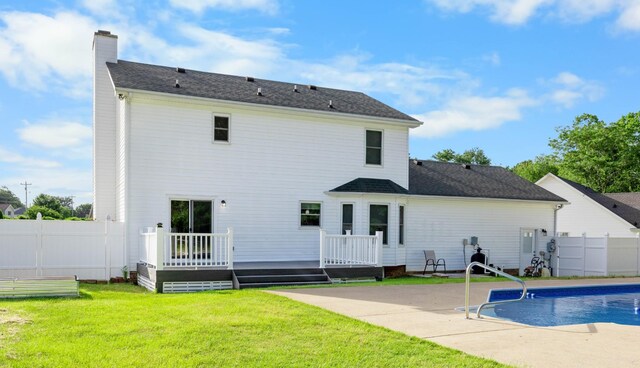 2746 Field Ct, Woodlawn, TN 37191 - rear view of property featuring a chimney, a patio, and a deck