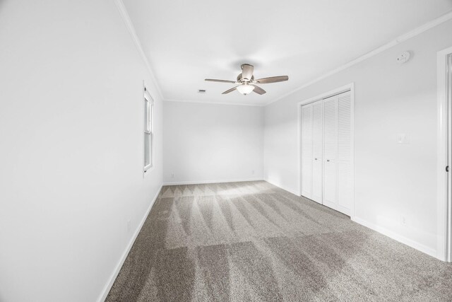 2746 Field Ct, Woodlawn, TN 37191 - unfurnished bedroom featuring crown molding, carpet, baseboards, a closet, and a ceiling fan