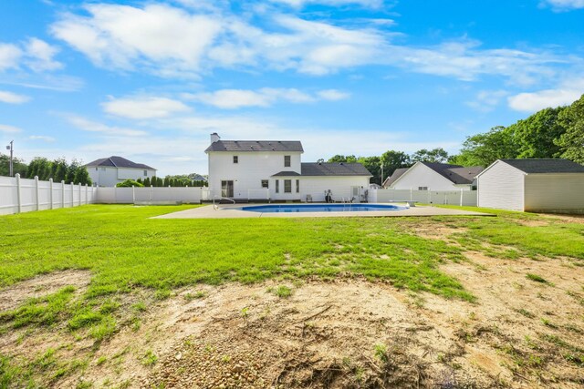 2746 Field Ct, Woodlawn, TN 37191 - back of property featuring an outbuilding and a patio