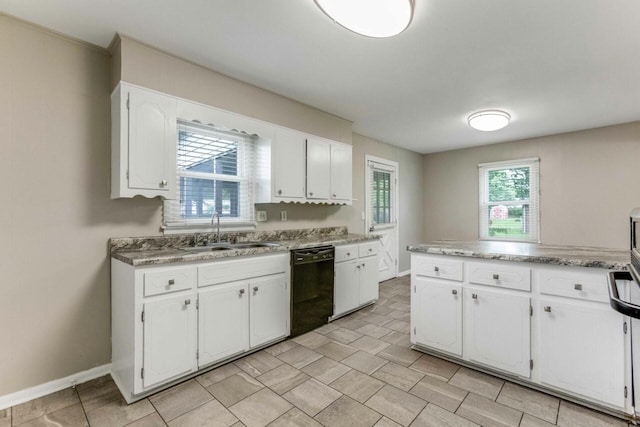 600 Holiday Park Dr, Hopkinsville, KY 42240 - kitchen with a sink, black dishwasher, white cabinetry, and baseboards