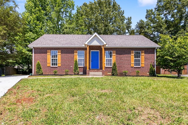 2549 Hillingdon Dr, Murfreesboro, TN 37127 - view of front of house featuring brick siding, a shingled roof, and driveway