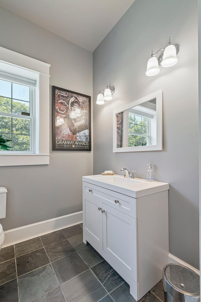 2111 Lovelace Ln, Murfreesboro, TN 37130 - bathroom with baseboards, vanity, toilet, and marble finish flooring