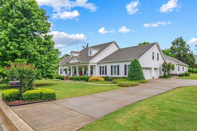 2111 Lovelace Ln, Murfreesboro, TN 37130 - view of front of house with a porch, concrete driveway, a front yard, and a shingled roof