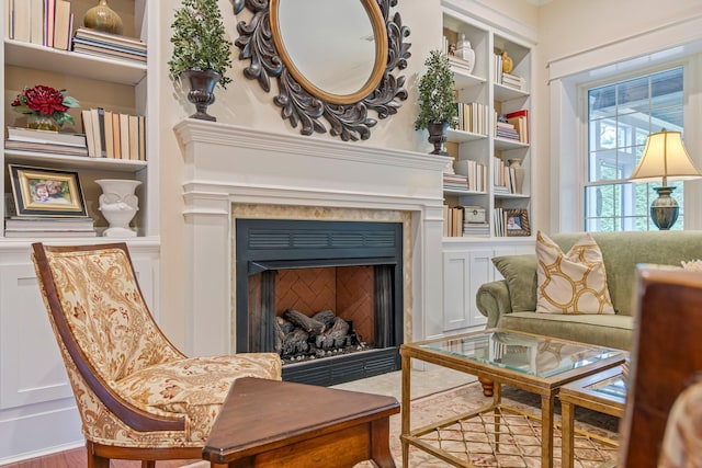 2111 Lovelace Ln, Murfreesboro, TN 37130 - living area with a fireplace, built in features, and wood finished floors