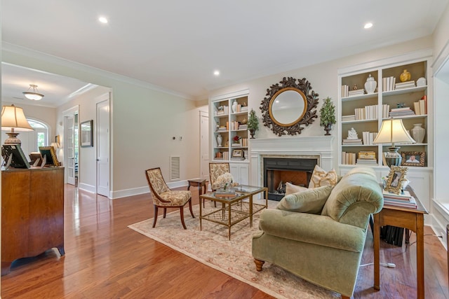 2111 Lovelace Ln, Murfreesboro, TN 37130 - living room with a fireplace, baseboards, wood finished floors, recessed lighting, and crown molding