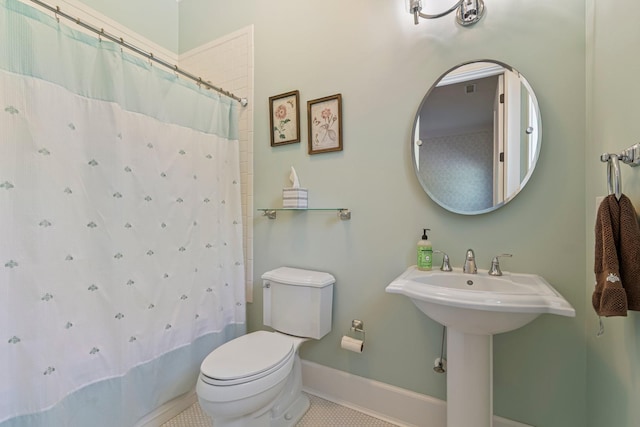 2111 Lovelace Ln, Murfreesboro, TN 37130 - bathroom with toilet, curtained shower, baseboards, and tile patterned floors