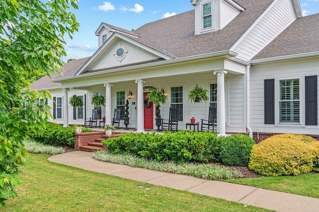 2111 Lovelace Ln, Murfreesboro, TN 37130 - neoclassical home with a shingled roof, a porch, and a front lawn