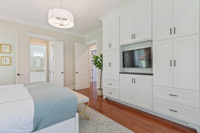 2111 Lovelace Ln, Murfreesboro, TN 37130 - bedroom with dark wood-style floors, crown molding, and ensuite bath