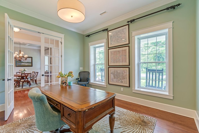2111 Lovelace Ln, Murfreesboro, TN 37130 - office area with french doors, a chandelier, wood finished floors, crown molding, and baseboards