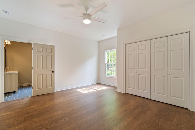 529 Wilson Run, Brentwood, TN 37027 - unfurnished bedroom with dark wood finished floors, baseboards, and ceiling fan