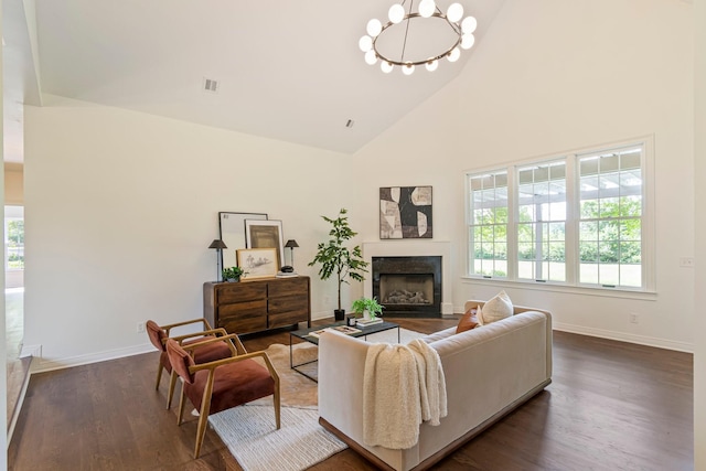529 Wilson Run, Brentwood, TN 37027 - living area featuring a chandelier, a premium fireplace, dark wood-style floors, high vaulted ceiling, and baseboards