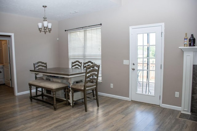 112 Read Tavern Rd, Hendersonville, TN 37075 - dining space with wood finished floors, healthy amount of natural light, a chandelier, and washer / dryer
