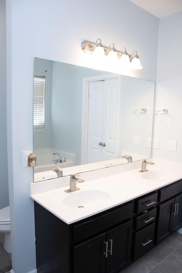 112 Read Tavern Rd, Hendersonville, TN 37075 - full bath featuring double vanity, tile patterned floors, toilet, and a bath