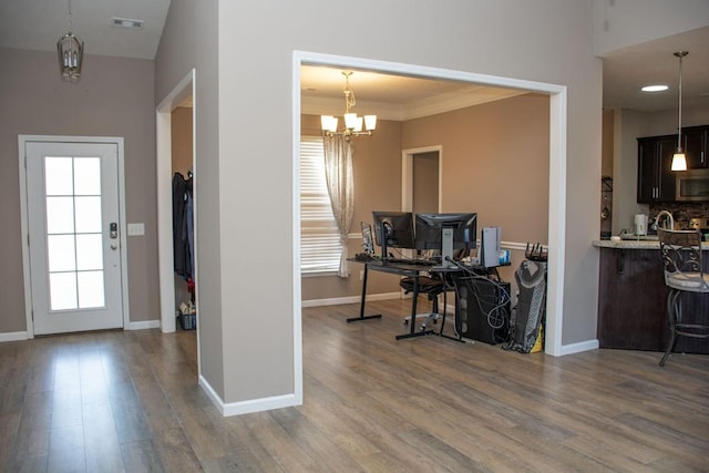 112 Read Tavern Rd, Hendersonville, TN 37075 - foyer with wood finished floors, baseboards, and a chandelier