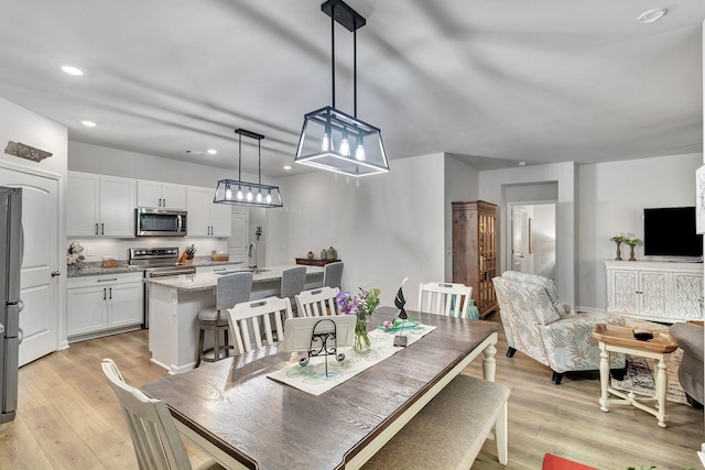 211 Addison Ave, Chapel Hill, TN 37034 - dining room with light wood finished floors and recessed lighting