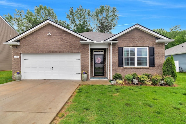 211 Addison Ave, Chapel Hill, TN 37034 - ranch-style house featuring brick siding, concrete driveway, a garage, and a front lawn
