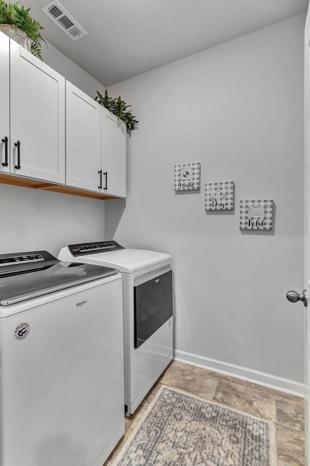 211 Addison Ave, Chapel Hill, TN 37034 - washroom featuring washing machine and clothes dryer, cabinet space, and baseboards