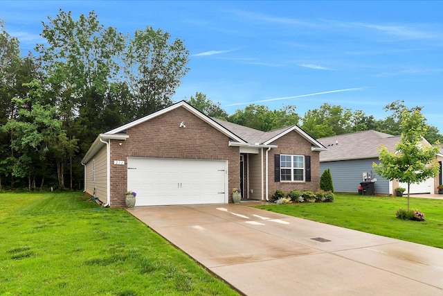 211 Addison Ave, Chapel Hill, TN 37034 - ranch-style house with brick siding, an attached garage, concrete driveway, and a front lawn