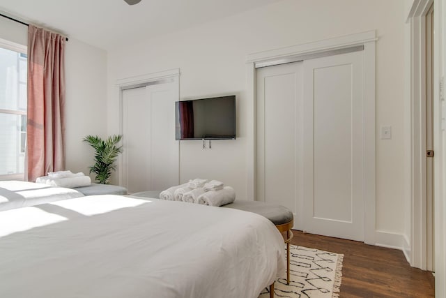 2001 Convent Pl Unit 7, Nashville, TN 37212 - bedroom featuring multiple closets and dark wood-style floors
