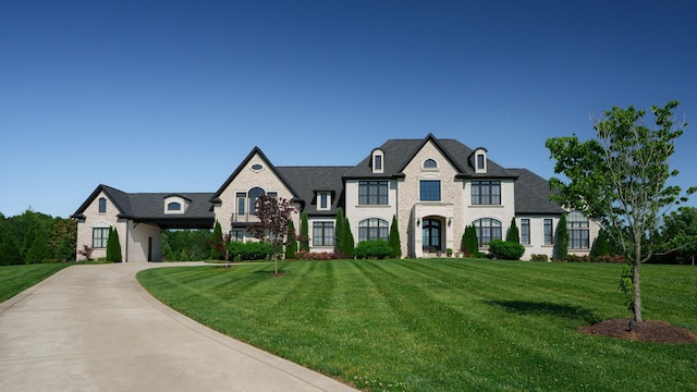 4740 Edwardian Trce, Franklin, TN 37067 - french country inspired facade with a front yard and concrete driveway
