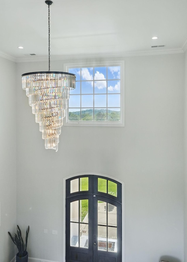 4740 Edwardian Trce, Franklin, TN 37067 - detailed view of a chandelier, ornamental molding, french doors, and recessed lighting