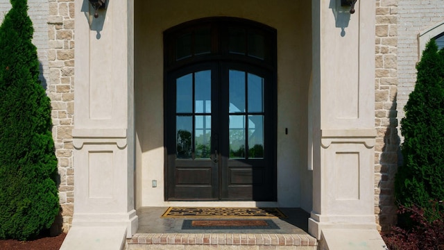 4740 Edwardian Trce, Franklin, TN 37067 - view of exterior entry with french doors, stucco siding, and stone siding