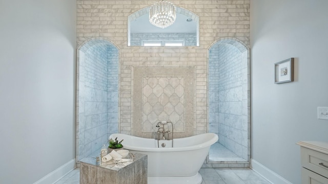 4740 Edwardian Trce, Franklin, TN 37067 - full bathroom with a chandelier, baseboards, a soaking tub, marble finish floors, and vanity