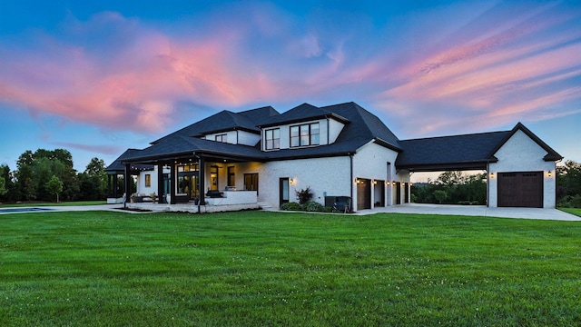 4740 Edwardian Trce, Franklin, TN 37067 - modern farmhouse style home with a lawn, covered porch, concrete driveway, and an attached garage