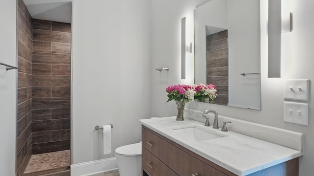 4740 Edwardian Trce, Franklin, TN 37067 - full bathroom with toilet, tiled shower, and vanity